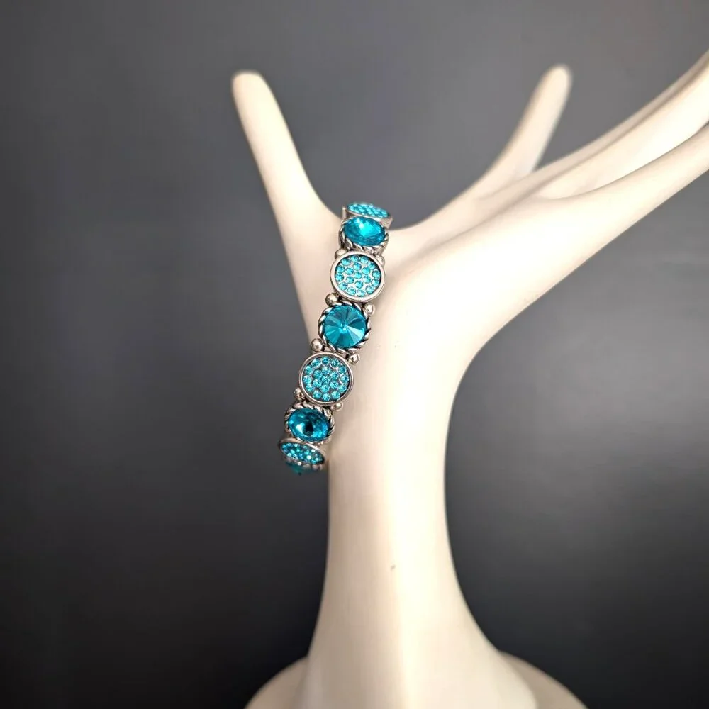 Silver stretch bracelet with bright blue beads